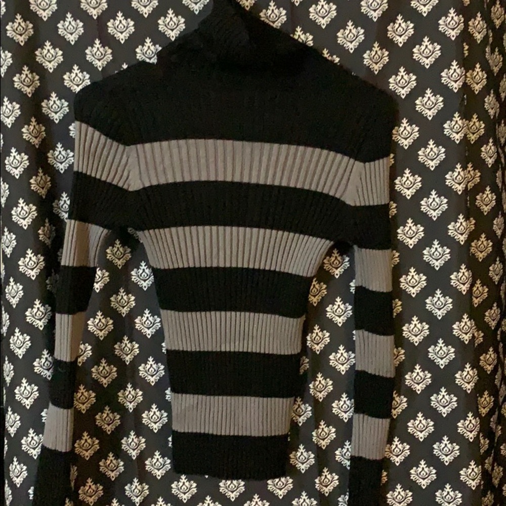 Striped turtle neck.